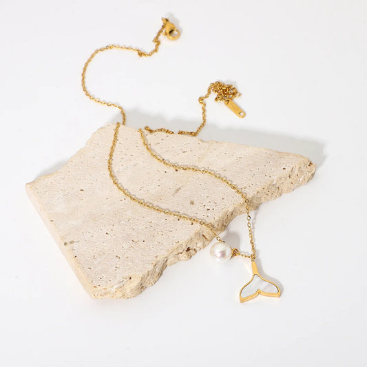 Fish Tail Pendant Attached With a Pearl