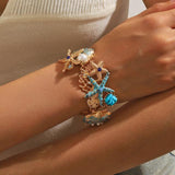 Ocean Themed Coral Starfish, Seashell and Pearls Bracelet