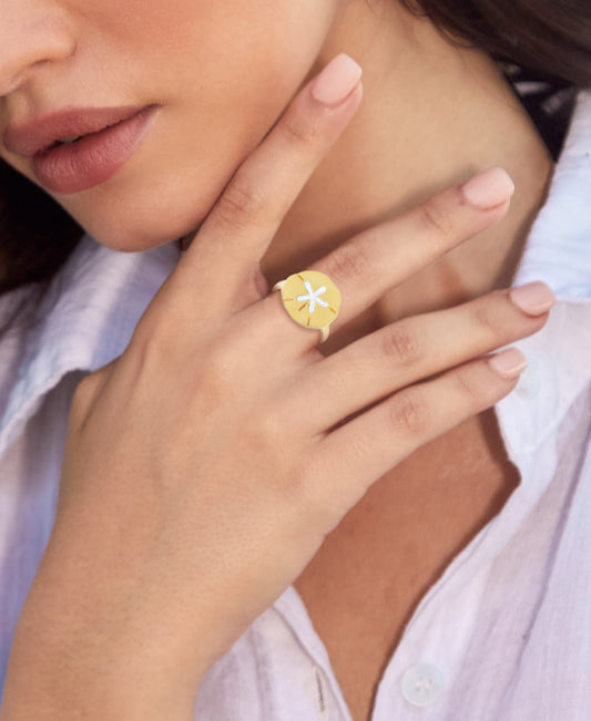 14K SAND DOLLAR RING WITH 16 DIAMONDS 0.09CT