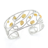 STERLING SILVER AND 14K BANGLE WITH YELLOW SAPPHIRES