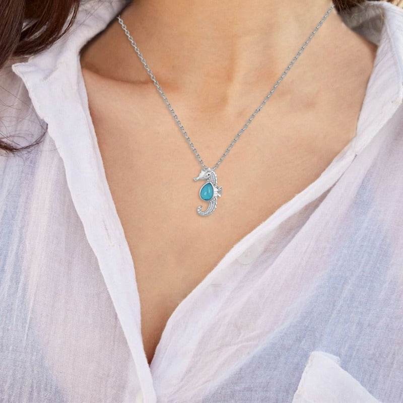 14K SEAHORSE PENDANT WITH DOUBLET RECON TURQUOISE AND CLEAR QUARTZ ON 18 INCHES CABLE CHAIN