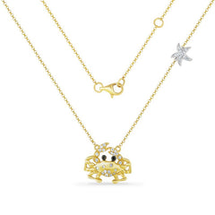 14K CRAB NECKLACE WITH 34 WHITE DIAMONDS 0.20CT & 2 BROWN DIAMONDS 0.01CT ON  18 INCH CHAIN  WITH STAR ON CHAIN